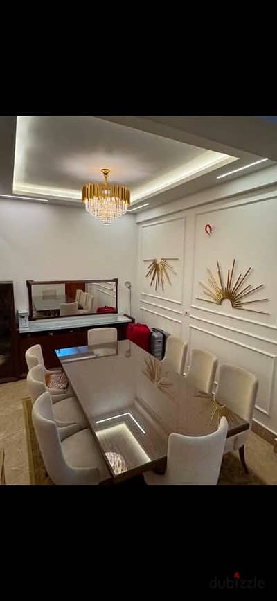 Apartment in Andalous, Fifth Settlement, first occupancy, super lux finishing, furnished with hotel-style furniture.