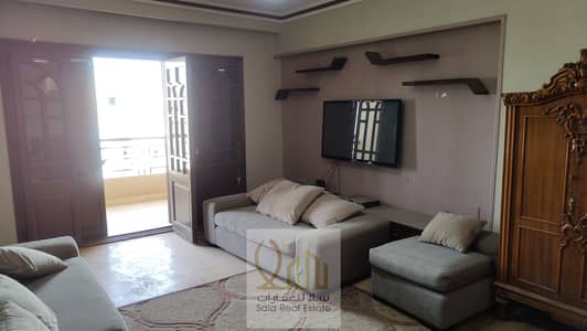 300m flat in a prime location on Nile Street and Al-Galaa Square in Dokki, overlooking the Nile, and in perfect condition