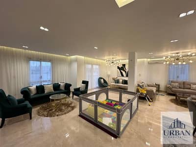 Duplex for sale in Al Jumaan 1 directly on the main road (Back facade)