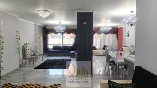 220m flat for sale in a prime location near Vigny Square and Nile Street in Dokki