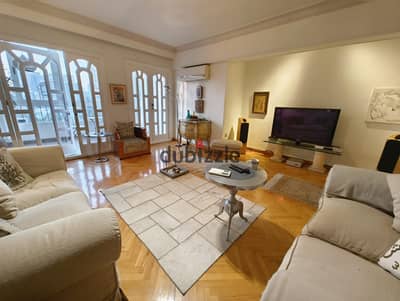 Furnished Apartment for Sale 200 m - Fully furnished - Premium finishing - Prime location in Dokki - Beautiful landscaped view