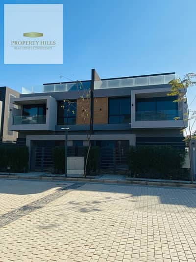 Twin house for sale in El Patio Casa compound—available for immediate handover—with an installment plan.