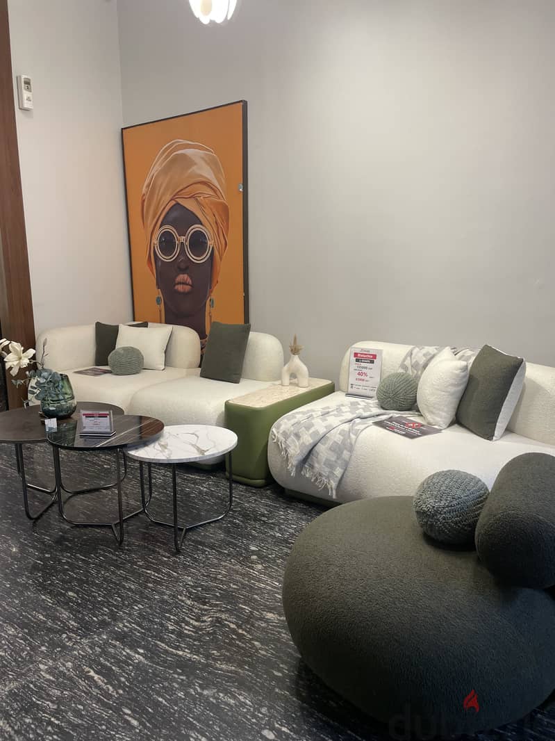 White and dark green sofa 1