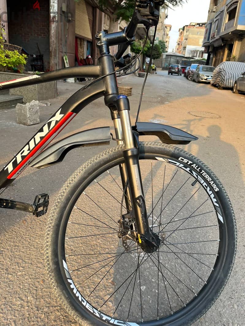 Trinx m 1000 5