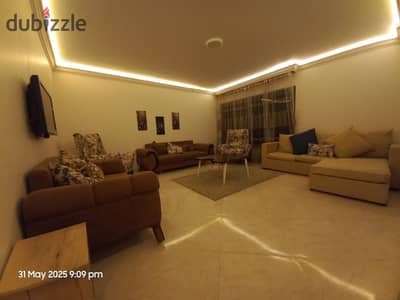 Furnished apartment for rent in the Ashjar Darna compound in Zahraa Al-Maadi consisting of two bedrooms, a reception room, two bathrooms, an air-conditioned kitchen, Wi-Fi, natural gas, on the ninth floor with an elevator, in a classy location near Carrefour