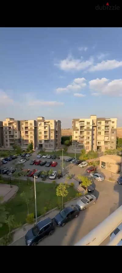 For rent, an apartment of 140 meters, on the fourth floor, corner unit, with an open landscape view in the Jannah Compound, 6th October.