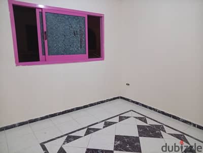 Apartment 110 sqm for annual rent modern family or groom super lux finishing has all facilities water electricity and natural gas 3 bedrooms reception 3 pieces kitchen bathroom fourth floor upper very comfortable staircase in Alexandria Al-Ajami kilo 21 first October main street in a very distinguished location