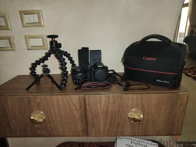 Canon EOS 250d حالة شبه جديدة بالظبط