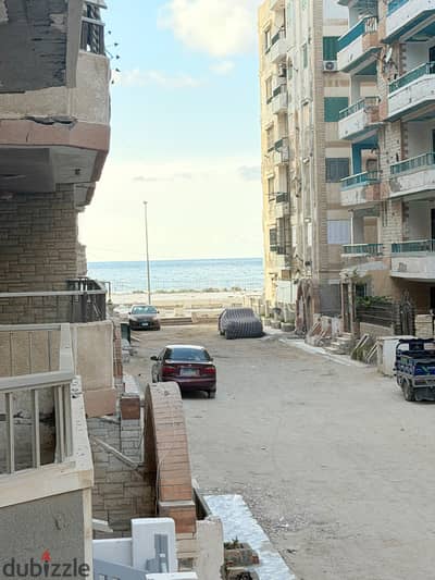 Apartment on the fifth floor directly on the sea for sale in Al-Ajmi, Al-Nakheel beach, cash or installment, very excellent location