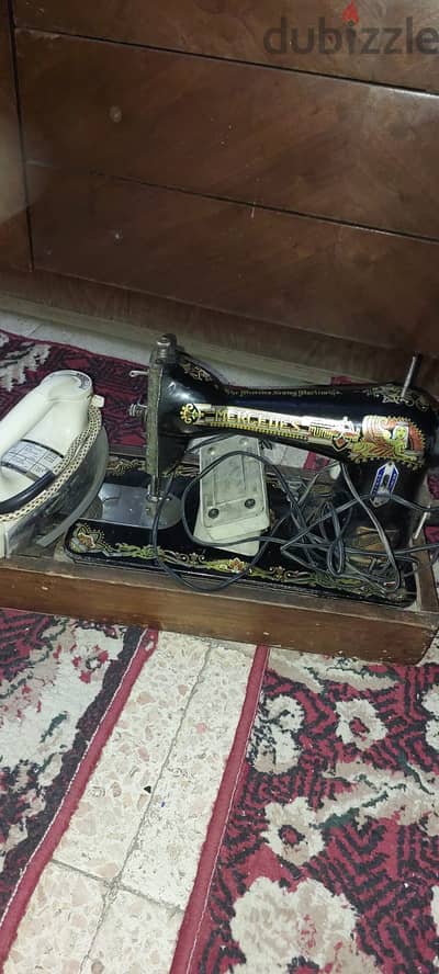 مكن خياطة جيدة وشغالة ومكواه انترناشونال