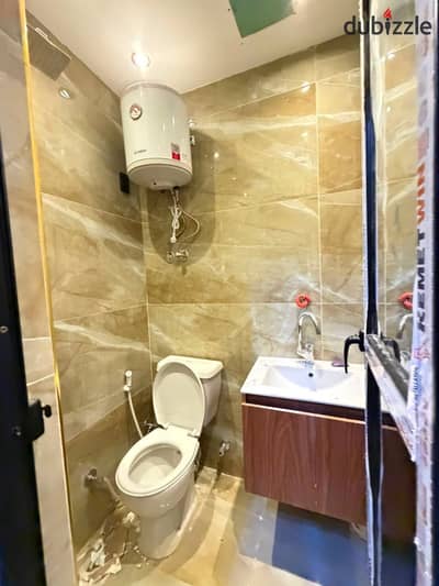 The first neighborhood, adjacent to 7, in front of Nawal University, elevated ground, private entrance, 30 meters, room, bathroom, and kitchen