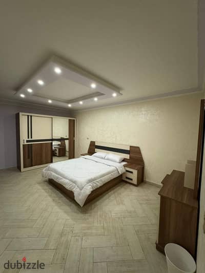 Furnished apartment for rent in Al-Rehab, 200 square meters, special finishes, garden view, next to services