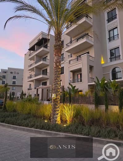 Apartment with a garden for sale in Village West, Sheikh Zayed; ready for immediate delivery, fully finished, and equipped with air conditioning.