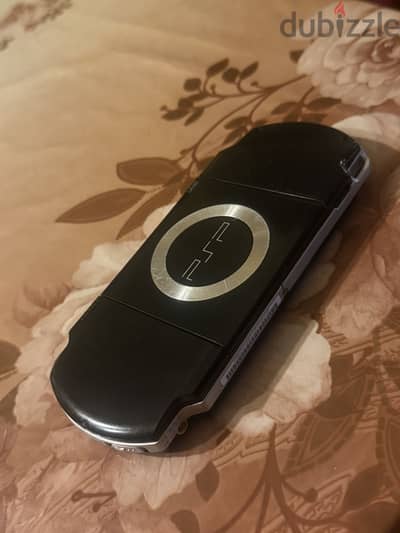 جهاز PSP 2000 (Slim) ب كارت ميموري 58 جيجا مليان العاب و برامج و افلام