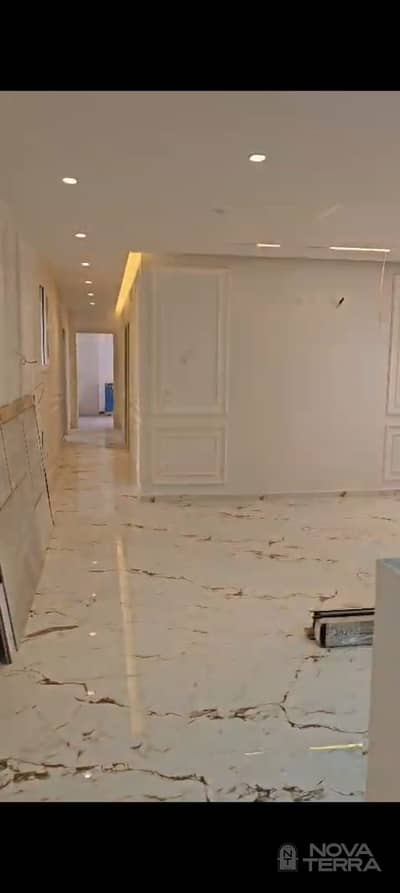 Ultra-super-lux apartment for sale in Al-Kanaria Compound, directly on the Central Axis; never previously occupied.