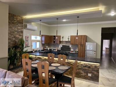 An exceptional 200-square-meter furnished apartment for rent in the Al-Yasmeen 3 Villas area (First Settlement), near Petrosport Club.
