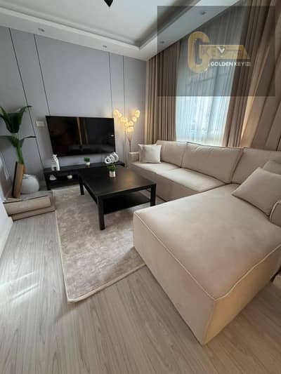 Luxury apartment with premium special finishing, elegant modern design, and a prime location close to all services in Madinaty.