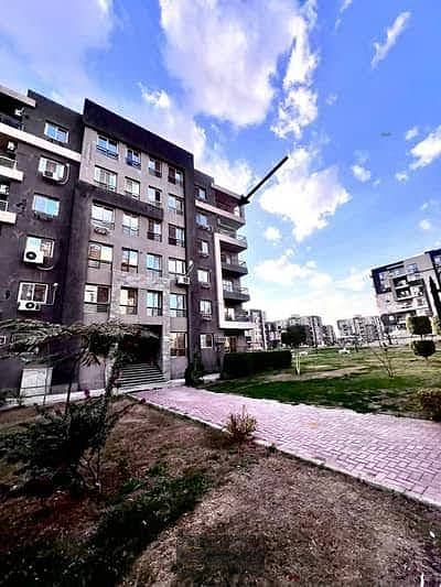 For sale in Dar Misr 12: A distinctive ground-floor apartment (150 sqm) featuring a prime location and an open view.