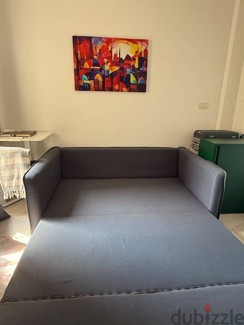Arika sofa bed used like new 1