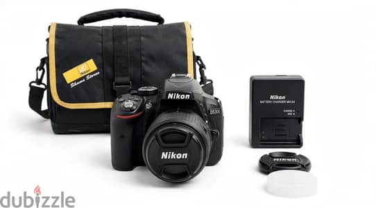 Nikon D5300 + 18-55 VR - شاتر قليل - بالشنطة والشاحن الأصلي