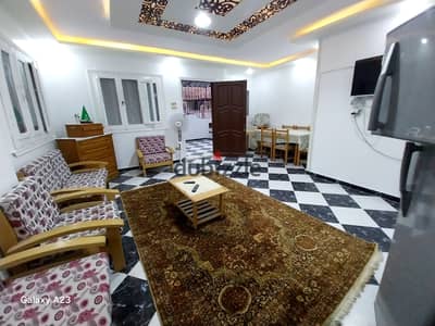 شقه ارضي بالفرش للبيع في العجمي شاطئ النخيل تشطيب التـــــــــــرا لوكس