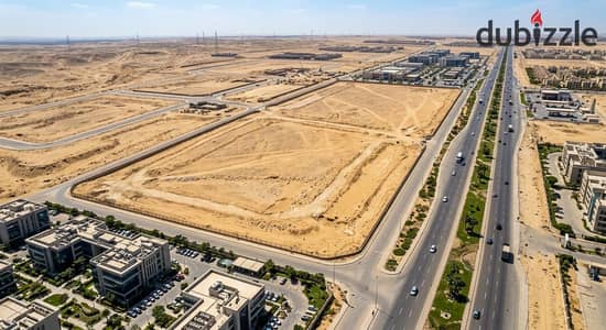 أرض بموقع متميز مباشرا على طريق مصر الإسكندرية الصحراوي 1 كم من المحور