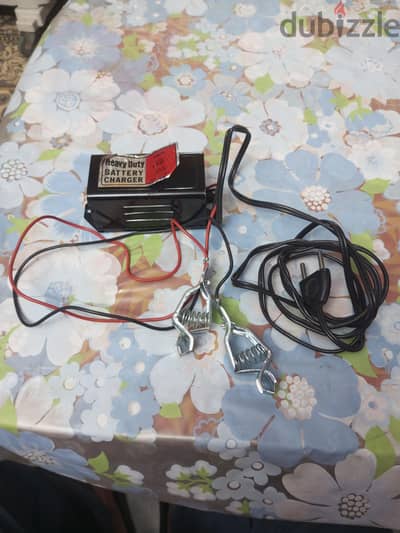 شاحن بطاريه عربيات وموتوسيكلات اطفال