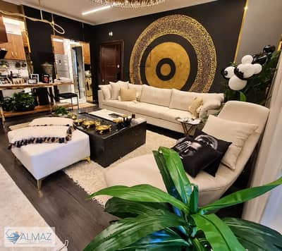 Fully air-conditioned, furnished 100m² apartment with a garden for rent in the Fifth Square (Al Marasem) compound, Fifth Settlement