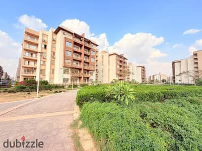 Apartment for Sale in Wessal Residence, Prime Location within the Compound, Wide Garden View