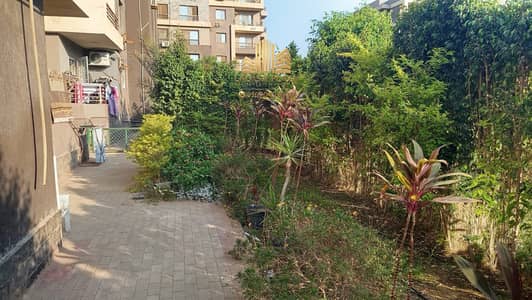 For sale, an apartment with 3 rooms on the ground floor in the Garden compound of Dar Misr 16, in front of Beverly Hills