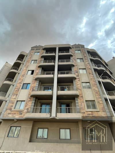 Apartment for sale in Al Katameya Sarayat Compound directly on the Ring Road in front of Al-Marshal Towers