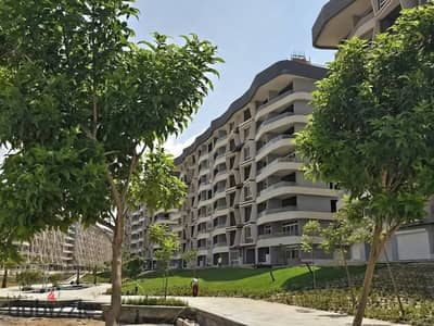 Ground floor apartment with garden for sale, ready for immediate handover in the Administrative Capital R7