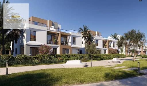 Twin house villa with a garden of 170 meters and a private swimming pool with a distinctive landscape view in Sheikh Zayed in the Green Belt