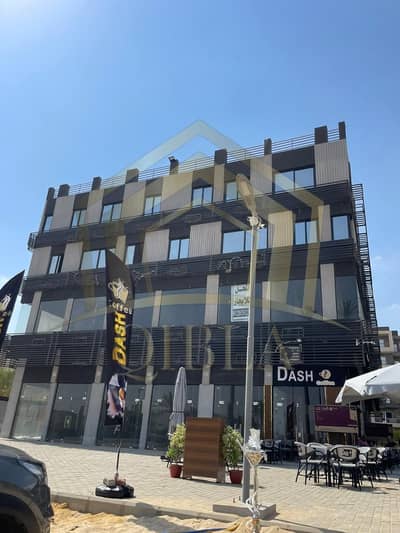 محل أرضي واجهة للإيجار في A Plaza الشيخ زايد | مشطب بالكامل