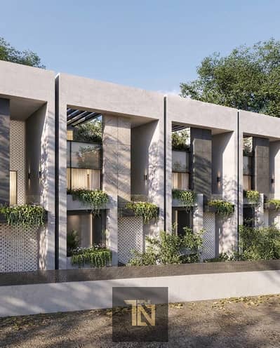 Middle townhouse with a garden for sale at Midtown East—a prime location in the Sixth Settlement, near Al Rehab and Madinaty—with a 10% down payment Middle townhouse with a garden for sale at Midtown East—a prime location in the Sixth Settlement, near Al Rehab and Madinaty—with a 10% down payment