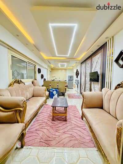 Apartment in Al-Ajmi, Al-Nakhil Beach, furnished with electrical appliances, the third number from the sea, luxurious and distinctive finishing, registered and complete with attachments.