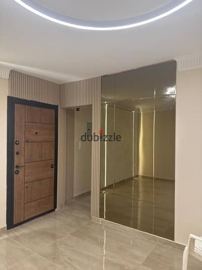 170 sqm apartment for rent in The Square Compound, New Cairo (Tagamoa); features high-end modern finishing and includes a kitchen.