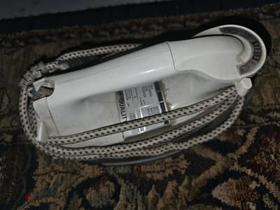 Electric iron / مكواه كهربائية