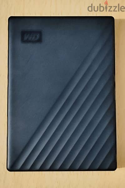 WD Portable device 4tera   حالة فوق الممتاز ويستيرن  هارد محمول ٤ تيرا