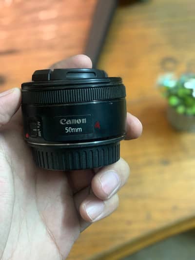 عدسه canon 50m بحاله الزيرو