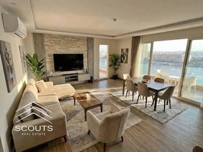 Furnished Apartment for Sale ( Living or Investment  )in Maadi, with a Direct Nile & Gold Island View,High Rental Returns ,Just Minutes from Hilton.