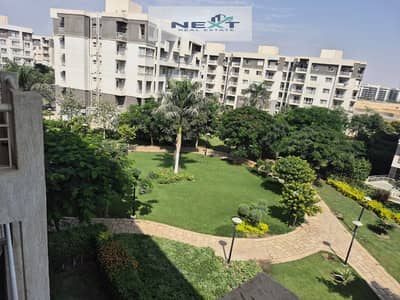For rent in Madinaty, a new law apartment, 116 sq m, company-finished, excellent condition, garden view, close to the mosque and services, minutes fro