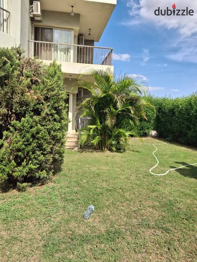 Ground apartment for rent in The Address compound, Sheikh Zayed - Includes air conditioning, kitchen, and appliances
