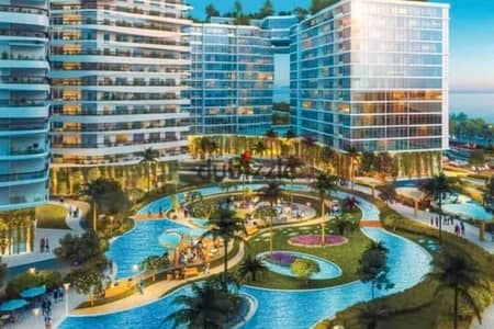 شقة فندقية للبيع 118م سموحة - كومباوند Sky line (فيو مفتوح على الفيلات)