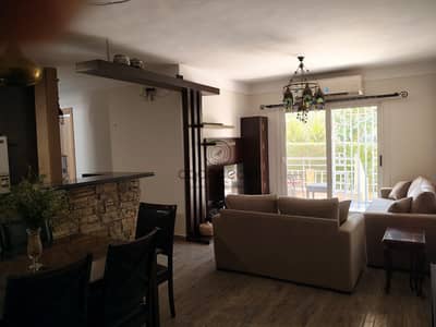 Furnished apartment with garden for rent in Madinaty B7, 89 sqm BUA, 45 sqm garden, 2 bedrooms, 2 bathrooms, fully furnished, EGP 35K monthly