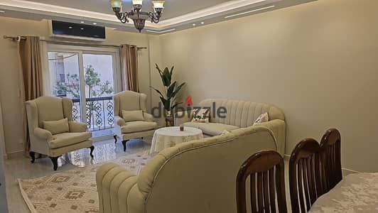Furnished apartment for rent in Al Rehab; prime location near Services and Avenue Mall.