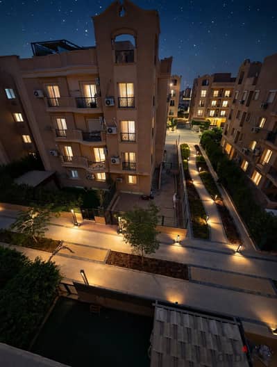Apartment for sale, ground floor with garden, area 170 sqm + 133 sqm garden in Diyar Al Taamer 2 Compound in 6th of October, minutes from Mall of Arab