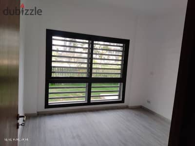 Apartment for rent in Privado, Madinaty, ground floor with a private garden, direct view of the lakes, 3 rooms, 2 bathrooms, kitchen, super lux finishing, excellent opportunity, 600 dollars monthly rent required
