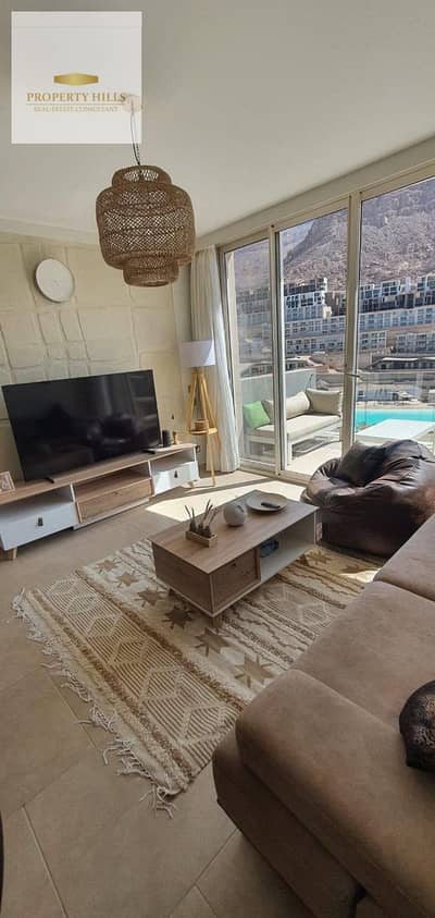 Fully finished 3-bedroom, 115 sqm chalet in IL Monte Galala, Ain Sokhna, by Tatweer Misr. Sea view, low down payment!