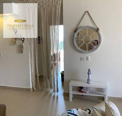 Chalet for sale at half its original price (fully finished - complete sea view) in the most distinctive vibrant location in Sokhna next to La Vista in a village operating all year round, with all rooms overlooking the sea